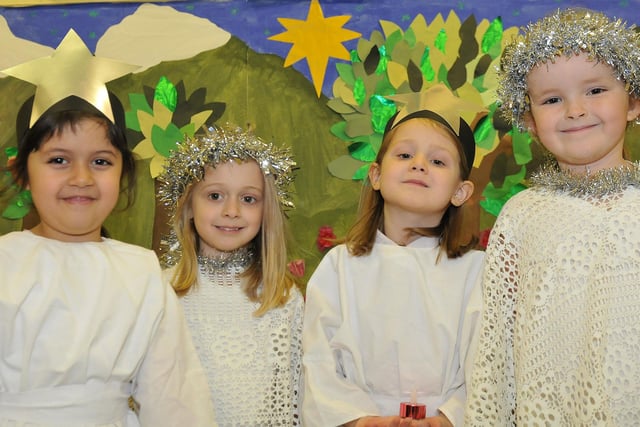 Pupils at Lynnfield Primary School dress as stars for the school's 2012 Nativity play.