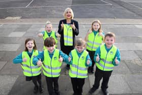 The children from Clavering Primary School with their high-vis vests.
