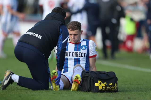 Jack Hamilton was taken off early in the second half in the defeat to Carlisle United with injury. (Credit: Mark Fletcher | MI News)