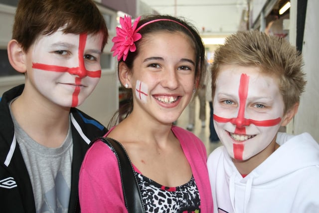 Ready to back England after a face painting session at the Indoor Market.