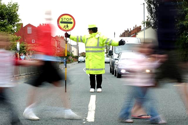 The council has found funding to save under threat school crossing patrol jobs.