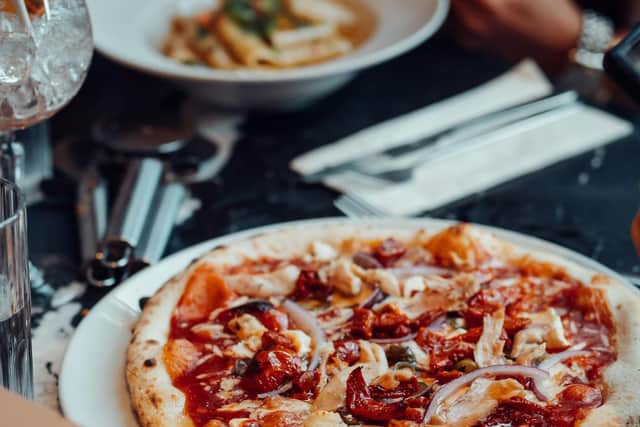 The restaurant offers unlimited pizza toppings for a fixed price