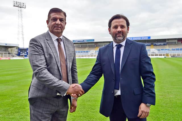Hartlepool United chairman Raj Singh and manager Paul Hartley shake hands after Hartley is appointed the club's new manager. Picture by FRANK REID