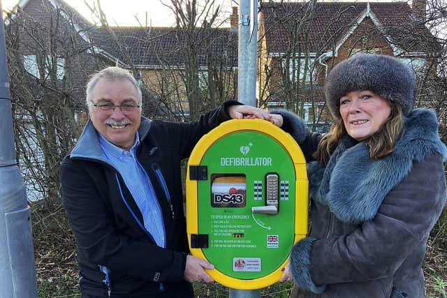 Bill and Pam Shurmer with a recently installed lamppost defibrillator on Elwick Road, near High Tunstall in Hartlepool.