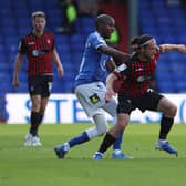 Jamie Sterry of Hartlepool United battles with Oldham Athletic's Dylan Bahamboula  during the Sky Bet League 2 match between Oldham Athletic and Hartlepool United at Boundary Park, Oldham on Saturday 18th September 2021. (Credit: Mark Fletcher | MI News)