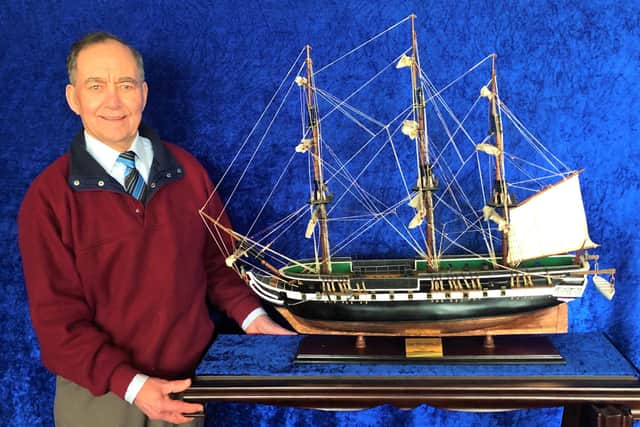 Cedric Williams with the fundraising replica ship