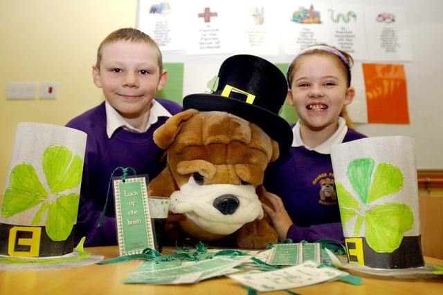Pupils celebrate St Patrick's Day in 2004, alongside their school mascot.