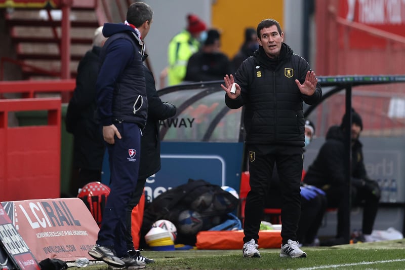 Words are exchanged betwee Nigel Clough and Cheltenham boss  Michael Duff during the FA Cup tie at Jonny Rocks Stadium.