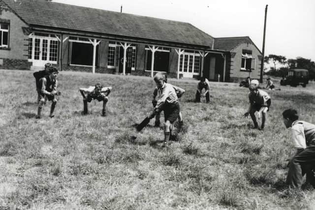 Youngsters enjoy a game of cricket during their holiday at Carlton Camp.