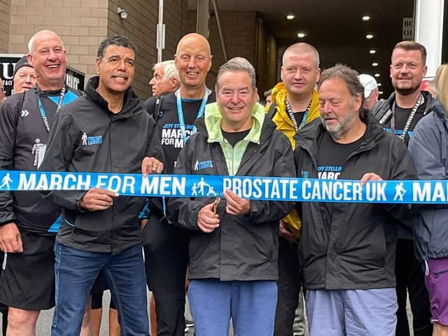 Jeff Stelling, centre, cuts a ribbon to begin the start of his latest series of marathon charity walks in aid of Prostate Cancer UK.
