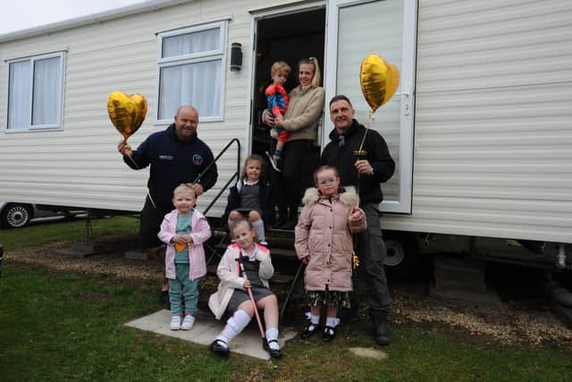 The opening of the Miles For Men new caravan at Crimdon Dene Holiday Park. Pictured are Micky Day from Miles for Men, Darren Cliff from Ambers Law and youngsters Bella Gill, Connie O'Keeffe, Dottie O'Keefe, Noah Griffiths with mum Abbie, and Lacey Robinson.