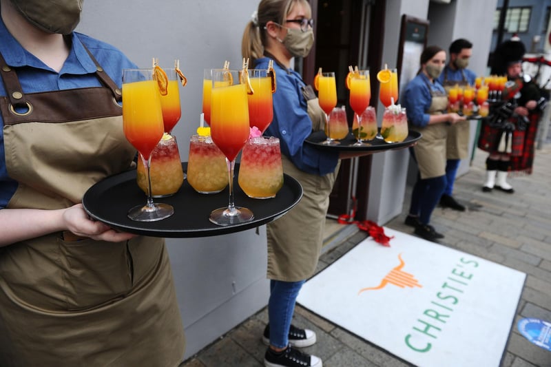 Glasses were raised to toast the opening of Christie's in Falkirk. Picture: Michael Gillen.