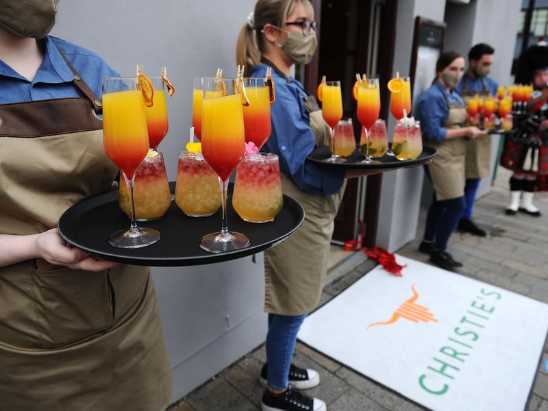 Glasses were raised to toast the opening of Christie's in Falkirk. Picture: Michael Gillen.
