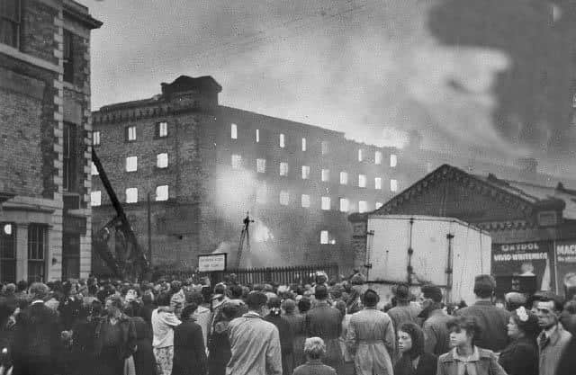 The scene in Church Street as onlookers watched the match factory blaze on August 30, 1954.