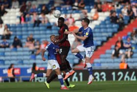 Hartlepool United's Zaine Francis-Angol wins a header against Zak Dearnley of Oldham Athletic during the Sky Bet League 2 match between Oldham Athletic and Hartlepool United at Boundary Park, Oldham on Saturday 18th September 2021. (Credit: Mark Fletcher | MI News)