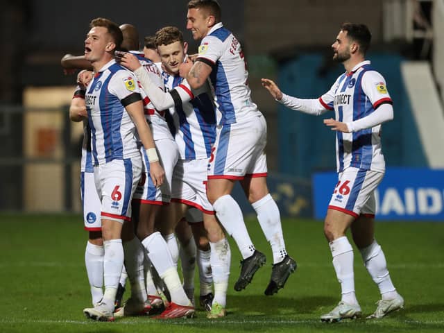 Hartlepool United's celebrate with Mark Shelton after he scored their third goal during the Sky Bet League 2 match between Hartlepool United and Harrogate Town at Victoria Park, Hartlepool on Sunday 1st January 2023. (Credit: Mark Fletcher | MI News)