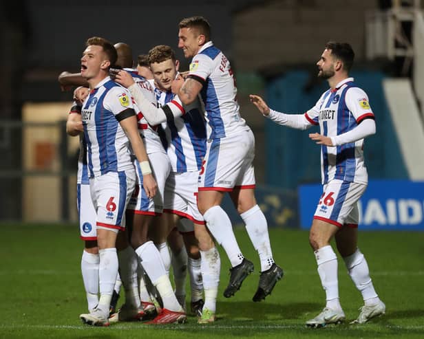 Hartlepool United's celebrate with Mark Shelton after he scored their third goal during the Sky Bet League 2 match between Hartlepool United and Harrogate Town at Victoria Park, Hartlepool on Sunday 1st January 2023. (Credit: Mark Fletcher | MI News)