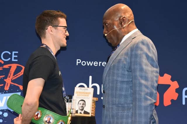 Hartlepool's Lester Kitching has a friendly face off with boxing legend Frank Bruno at the business seminar in Dublin.