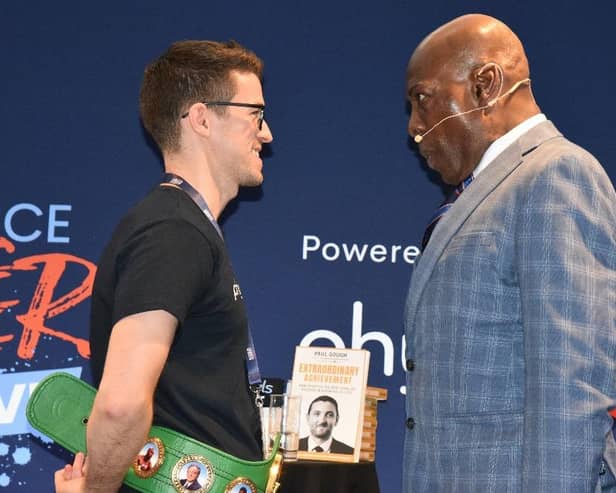 Hartlepool's Lester Kitching has a friendly face off with boxing legend Frank Bruno at the business seminar in Dublin.