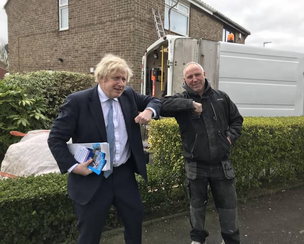 Kevin Richardson, right, with Boris Johnson in Mildenhall Close, Hartlepool.