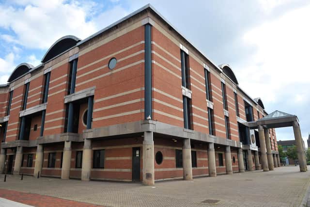 A Hartlepool man threatened to burn down a businessman's home over a debt, Teesside Crown Court was told.