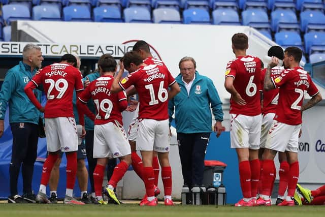 Neil Warnock gives instructions to his Middlesbrough team at Reading.