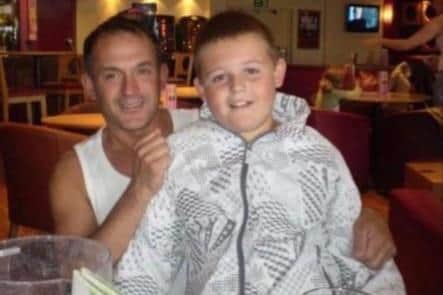 Adam Garrington as a youngster, pictured with his dad Barry.