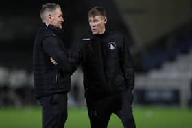 Hartlepool United assistant manager Clint Hill and caretaker manager Tony Sweeney (r)  during the EFL Trophy match between Hartlepool United and Everton at Victoria Park, Hartlepool on Tuesday 2nd November 2021. (Credit: Mark Fletcher | MI News)