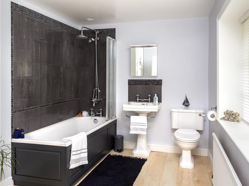 There are three bathrooms throughout the property, with the main family bathroom incorporating a large bath with Victorian style, twin headed shower, WC and wash hand basin.