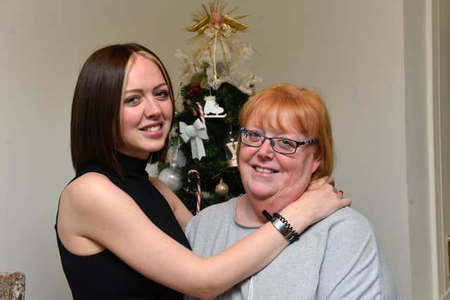 Long-haul flight attendant Jade Henderson has recovered from a bleed on the brain. Here she is at home with her mother Sharon Henderson.