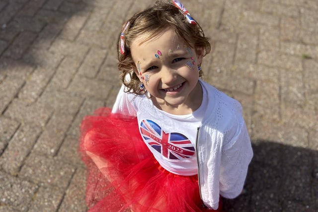 Poppy Preston looking very patriotic as she joins in with the Queen's Jubilee celebrations at Mildenhall Close.