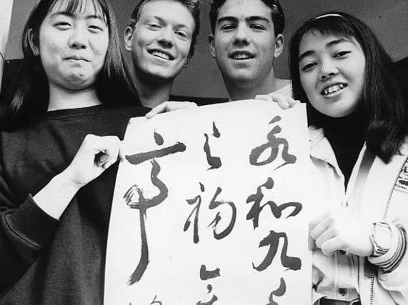 Japanese exchange students Satoko Fukase and Reika Arimura take part in a year long exchange visit at the college in 1991. Chris Craig and John Cusworth are pictured alongside them.