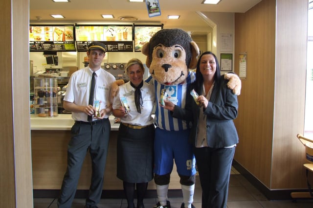 Hartlepool United mascot H'Angus the Monkey joined McDonald's staff in Hartlepool.