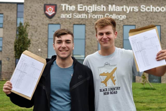 Jack and Ben collect their GCSE results from English Martyrs School. Picture by BERNADETTE MALCOLMSON