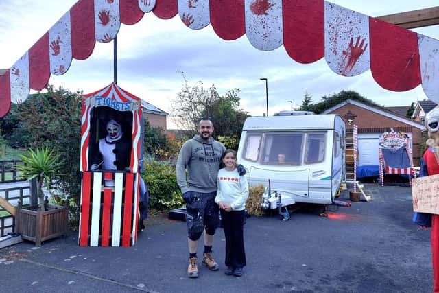 Pete and daughter Ariana Noble at the entrance to this year's display.