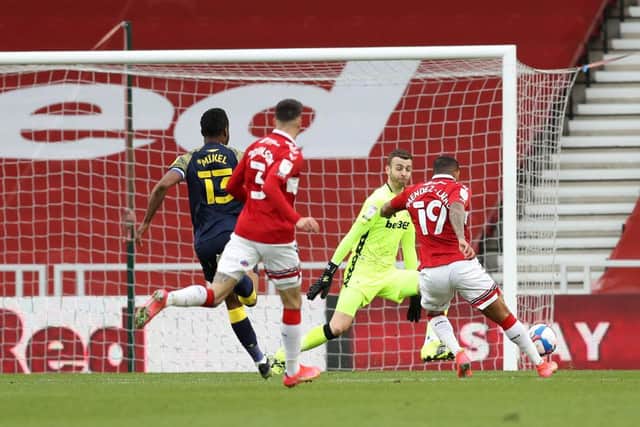 Nathaniel Mendez-Laing of Middlesbrough scores his team's third goal against Stoke.