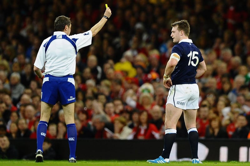 Stuart Hogg of Scotland being shown a yellow card for a dangerous tackle during the RBS Six Nations match between Wales and Scotland at Cardiff's Millennium Stadium on March 15, 2014.  (Photo by Laurence Griffiths/Getty Images)