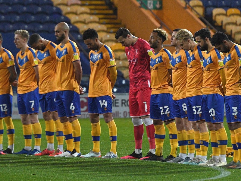 A minutes silence before kick-off for the death of the Mansfield Town owner John Radford's mother