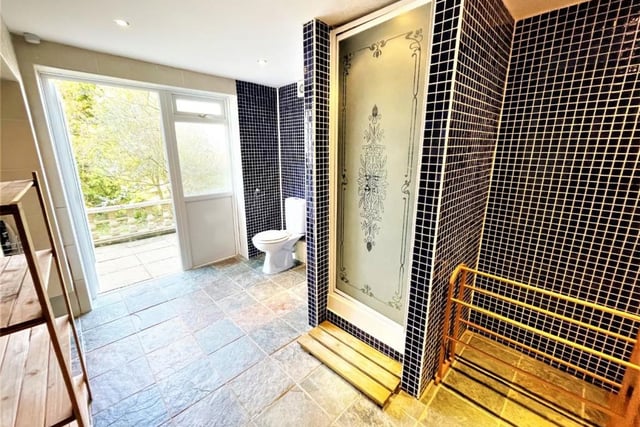 The huge sauna/shower room on the ground floor is one of the highlights of the home.