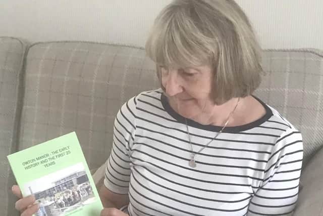 Frances Wilson with a copy of her new book Owton Manor - The Early History and the First 25 years.