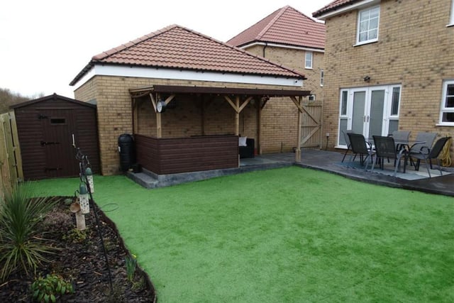 This home has a large garden featuring a garden shed, gazebo and seating, decking and a sauna.