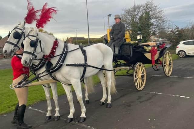 Santa travelled in a horse drawn carriage provided by John Moorhouse.