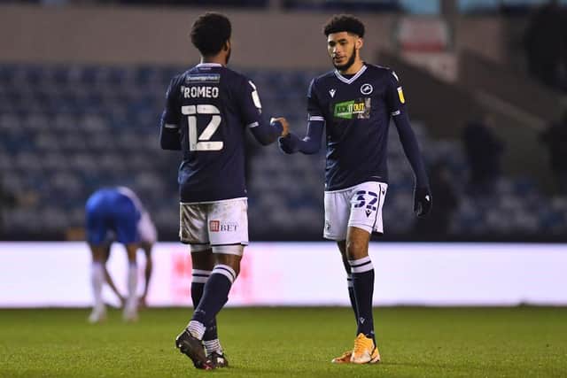 Mahlon Romeo of Millwall celebrates with teammate Tyler Burey following the Sky Bet Championship match between Millwall and Queens Park Rangers at The Den on December 08, 2020 in London, England(Photo by Justin Setterfield/Getty Images)
