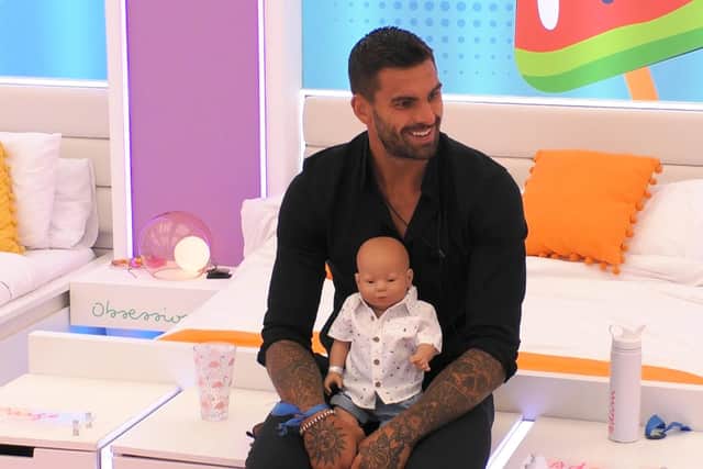 Adam with the baby.