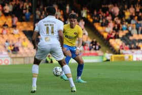Josh Hawkes playing against Port Vale.