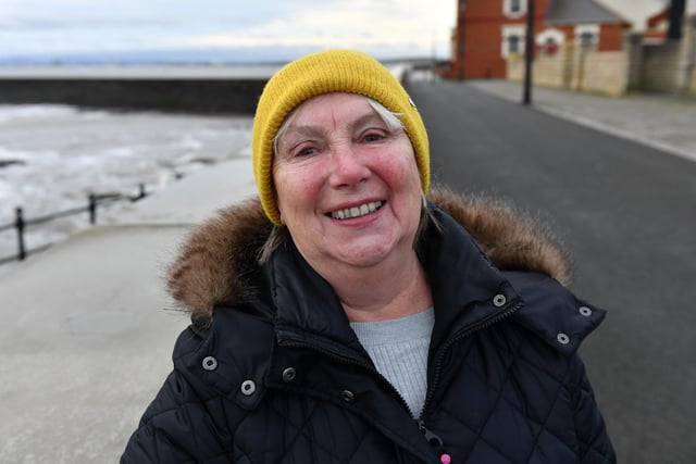 A lovely smile from Val Cook as she takes a walk on the Headland in February.