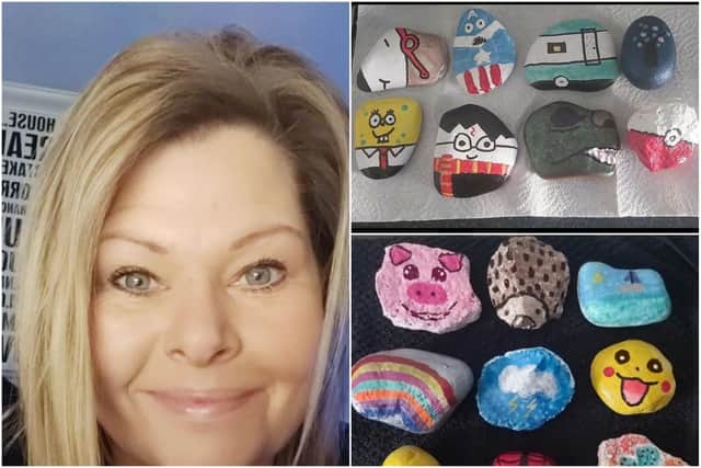 Helena Dodds and some of her decorated stones she made during lockdown for children to find.