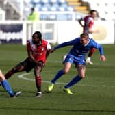 Gary Liddle and Nicky Featherstone of Hartlepool United and Niko Muir of Woking during the Vanarama National League match between Hartlepool United and Woking at Victoria Park, Hartlepool on Saturday 20th March 2021. (Credit: Chris Booth | MI News)