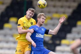 Jack Hamilton of Livingston  battles for possession with Filip Helander of Rangers FC  during the Ladbrokes Scottish Premiership match between Livingston and Rangers at Tony Macaroni Arena on August 16, 2020 in Livingston, Scotland. (Photo by Willie Vass/Pool via Getty Images)