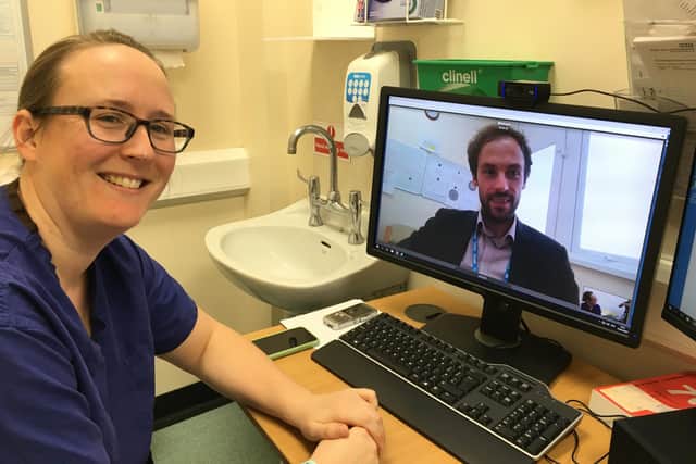Consultant Gastroenterologist Roisin Bevan and Michael Butler, Outpatients & Pathways Manager (onscreen), take part in an online consultation.